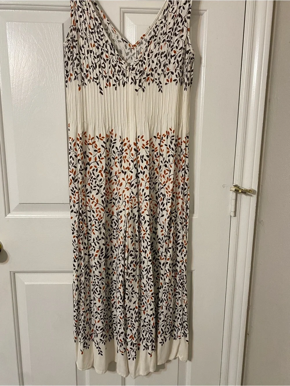 Sleeveless Cream Maxi Dress with Black and Rust Leaf Print